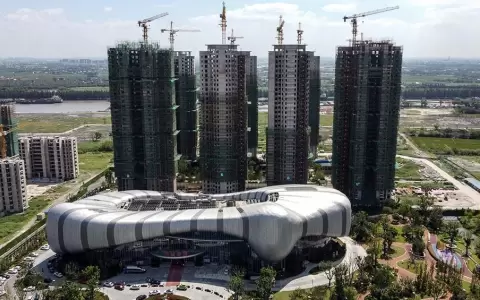 Crisis de gigante inmobiliario chino empuja a los mercados hacia la baja