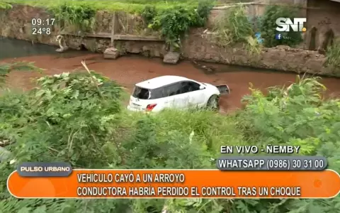 Accidente deja a autom�vil en arroyo �emby