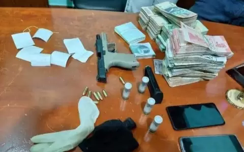 Detienen a polic�as que se quedaron con dinero de millonario asalto