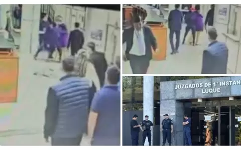 Momento en que tratan de atajar a la mujer para que evite una tragedia.